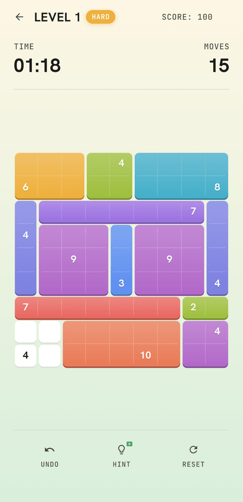 Recto Shikaku puzzle on iPhone: a colorful 9×9 hard-level board almost fully covered with candy-colored rectangles